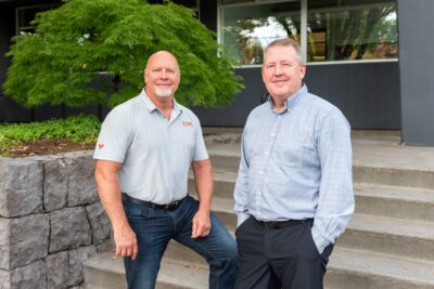 Chris and Greg on the front steps of VLMK