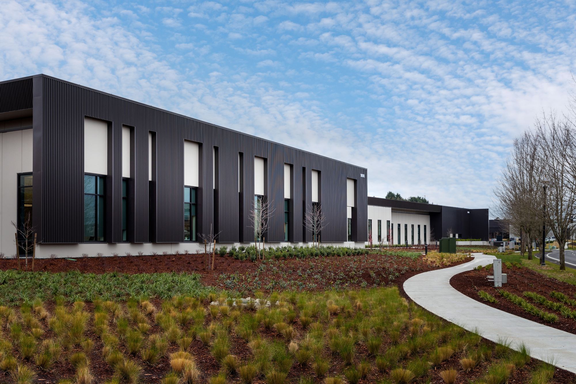 Columbia Tech Center landscaping grasses outside black and white buildings