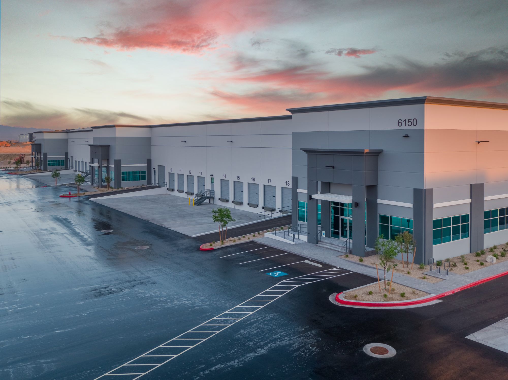 Picture of Tropical Speedway Commerce Center building at sunset