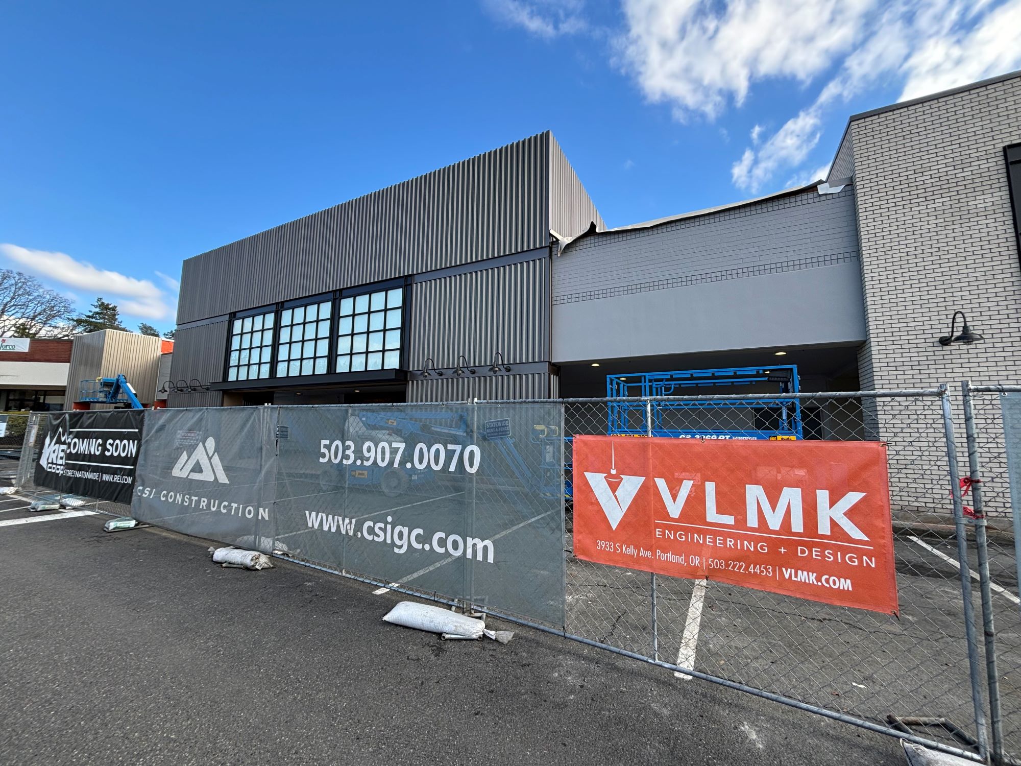 REI Co-op Building surrounded by fence under construction