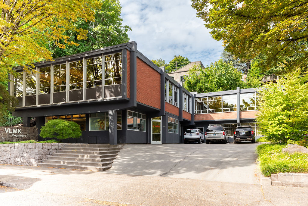 VLMK Portland Office Exterior of midcentury modern office building with trees